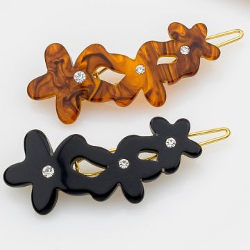 Τσιμπιδάκι με λουλούδια σε καφέ και μαύρο